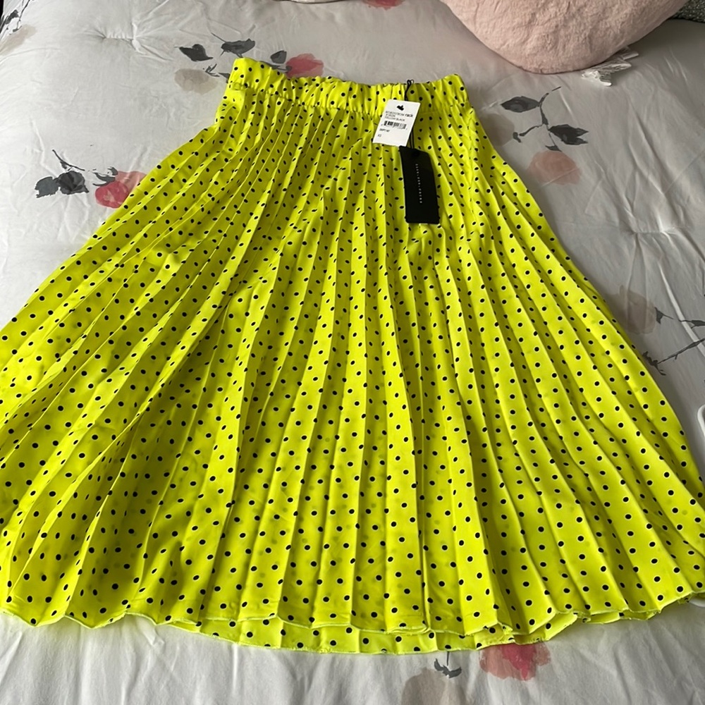 Brand new knee length polka dot skirt